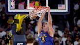Nikola Jokic leads NBA champ Denver Nuggets past LeBron James, Lakers in playoff opener