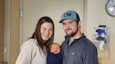 Mom, dad and newborn son all share the same birthday