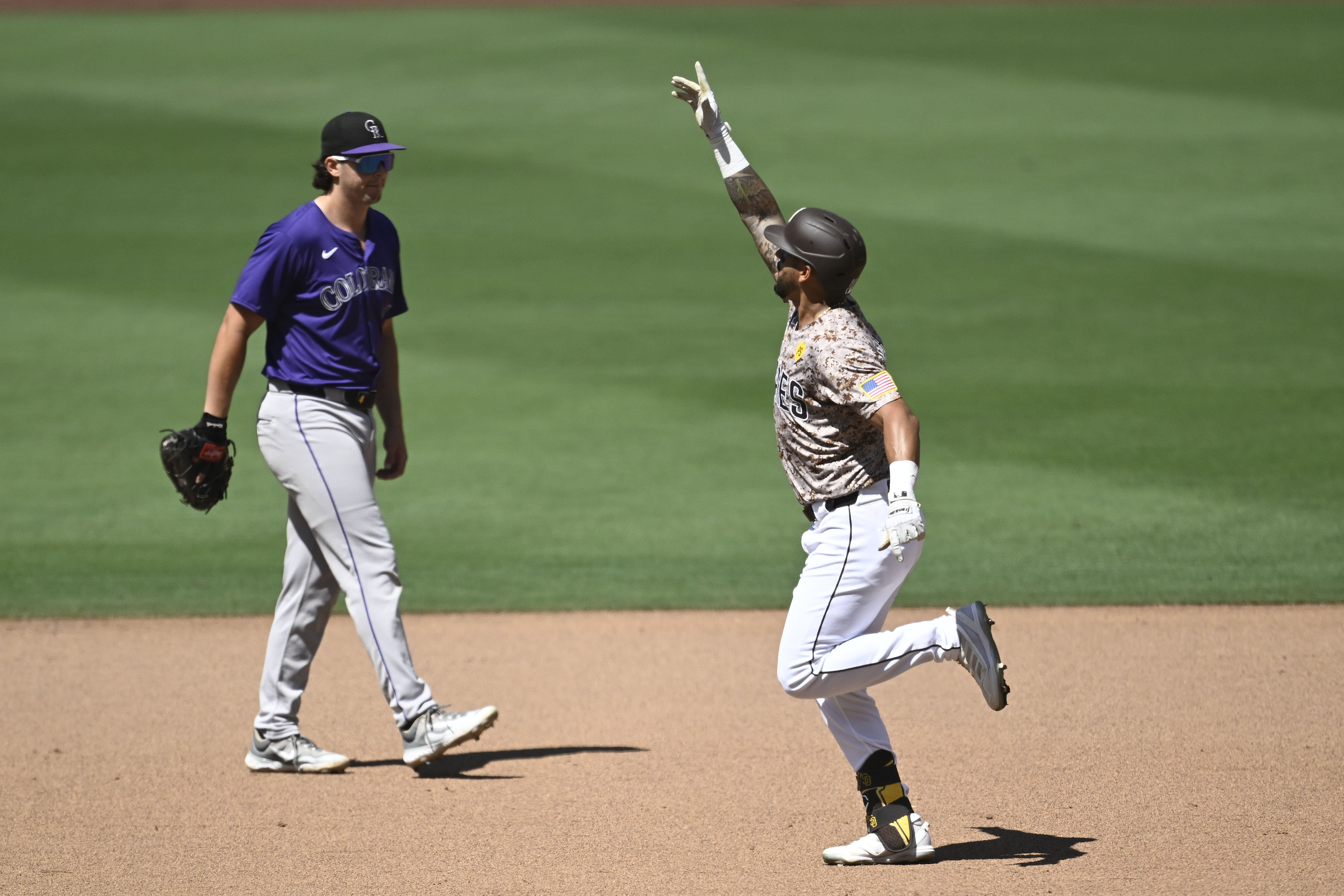 David Peralta hits a homer and robs another as the Padres beat the Rockies 10-2 for a series win