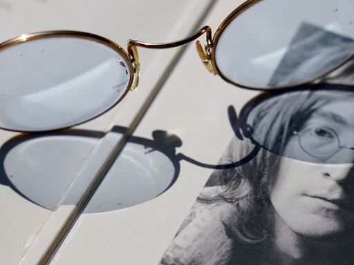 Blue-tinted glasses given by John Lennon to be auctioned with Abbey Road photos