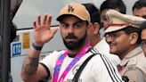 World Cup Winner Virat Kohli Spotted at London Airport, Clicks Selfie With Fan - News18