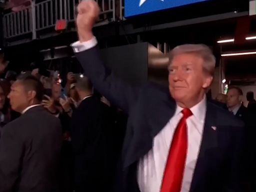Split screen: Trump triumphant at RNC convention as Biden battles for his political life