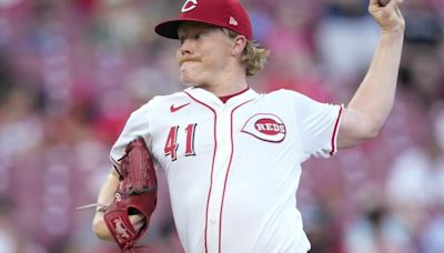 Hinds homers in big league debut and Abbott goes 7 innings as Reds blank Rockies 6-0