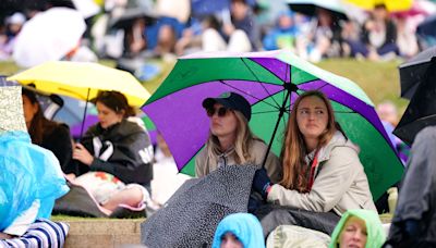 ‘Terrible’ weather blamed for low Wimbledon crowds as UK set for downpours