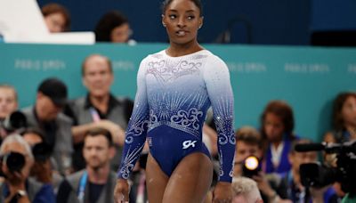 A slip on the balance beam and penalties on the floor cost Simone Biles another gold medal