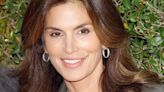 ‘Queen’: Supermodel Cindy Crawford, 56, shimmers at Miami gala in metallic gold dress