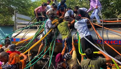 India's 'glaring inequalities' laid bare as hundreds wait for water amid record breaking heatwave