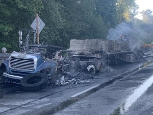 Hit-and-run crash with semi causes fire, long backups on I-405 in Renton