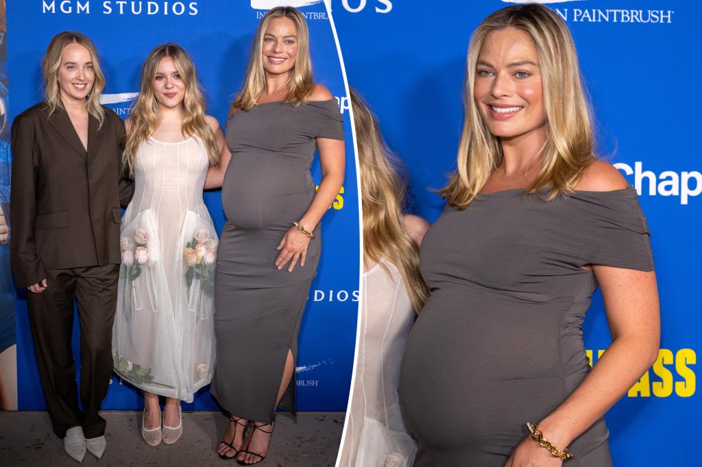 Margot Robbie shows off baby bump in second-skin dress on first red carpet since announcing pregnancy