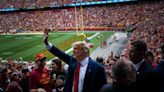 Trump greeted with a mix of applause and audible boos at Iowa college-football game, says report