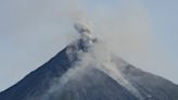 Philippine volcano eruption that displaced thousands may last for months, officials warn