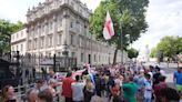 Protesters gather outside Downing Street after reported arrest of Tommy Robinson