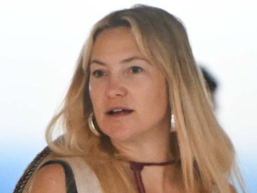 Kate Hudson bares her long legs in shorts as she arrives at JFK