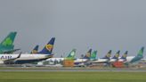 California air-charter firm diverts 5 Boeing jets with more than 1,000 American passengers on board because Dublin airport was understaffed