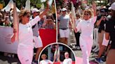 Energized Halle Berry walks Olympic torch down Croisette during Cannes Lions festival