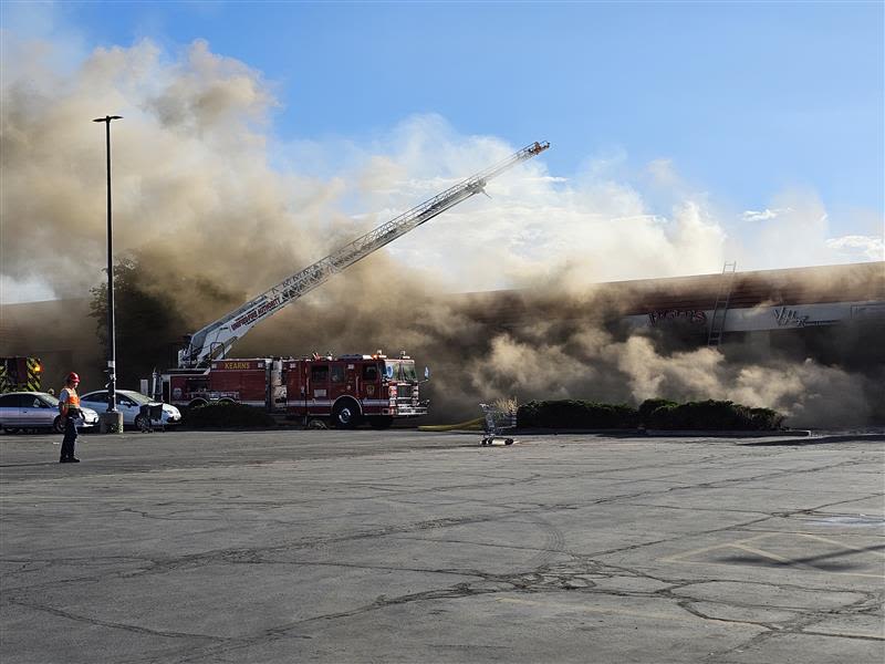 West Valley strip mall engulfed in flames, firefighter injured