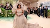 Mindy Kaling Is a ‘Melting Flower of Time’ in Sculptural Beige Gown at the 2024 Met Gala