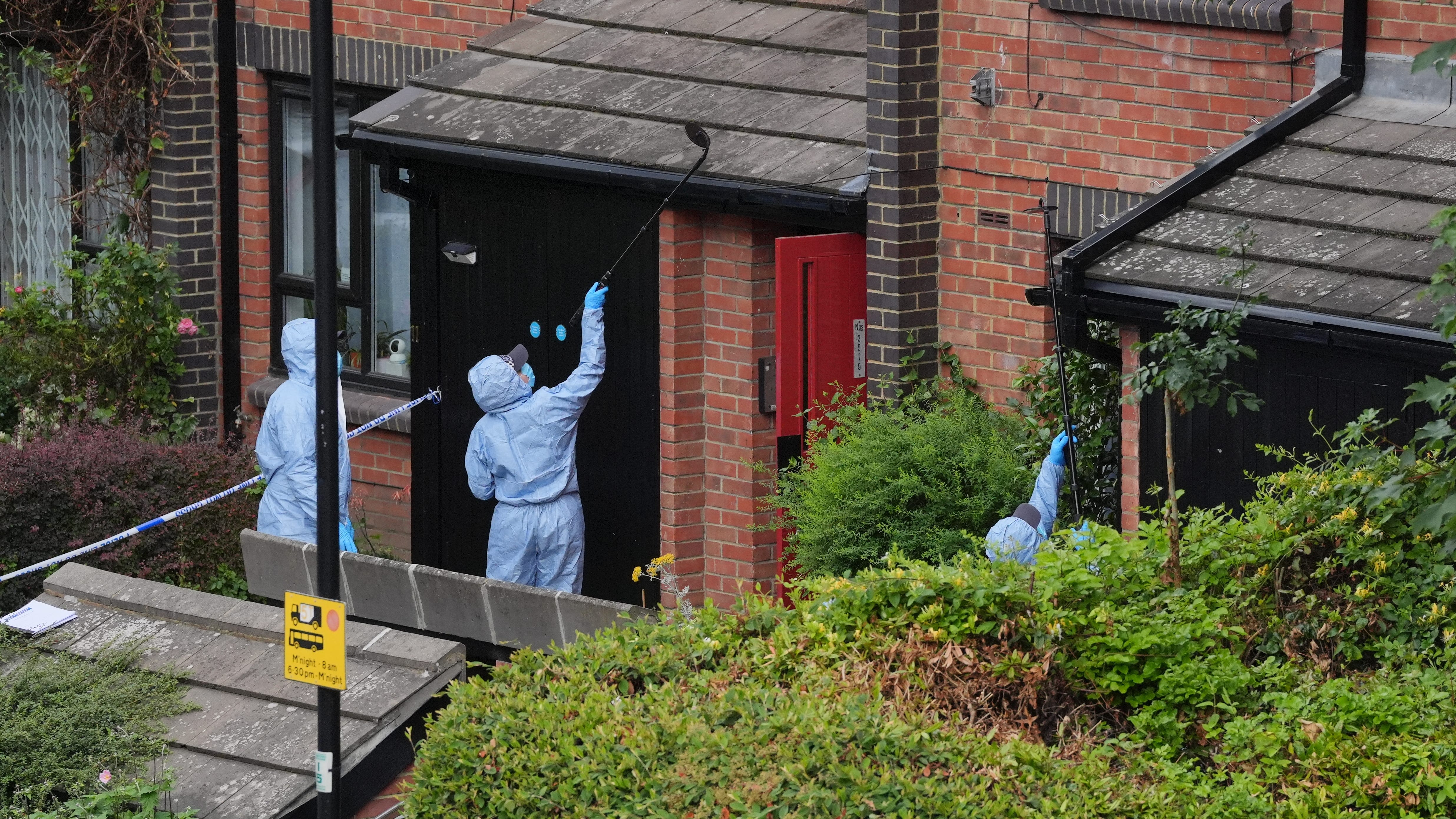 Man appears in court charged with murder over bodies found in suitcases