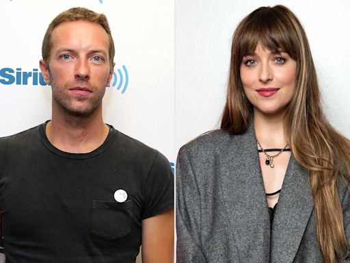 Dakota Johnson Watches Fiancé Chris Martin Perform with Coldplay During Glastonbury Headlining Set