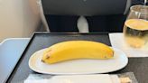 A business-class airline passenger who ordered vegan food says it was insulting to be served one banana along with a pair of chopsticks