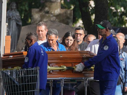 Brazil buries pilot who died in plane crash that killed 62, as questions remain about its cause