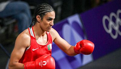 Boxer Imane Khelif guaranteed a medal as IOC condemns questions about her gender identity