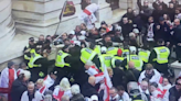 St George's Day central London rally turns violent as brawl with police erupts and four arrests