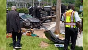 Grady Hospital ambulance flips onto side during crash with car in Atlanta