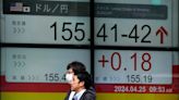 Stock market today: Asian benchmarks mostly slide as investors focus on earnings