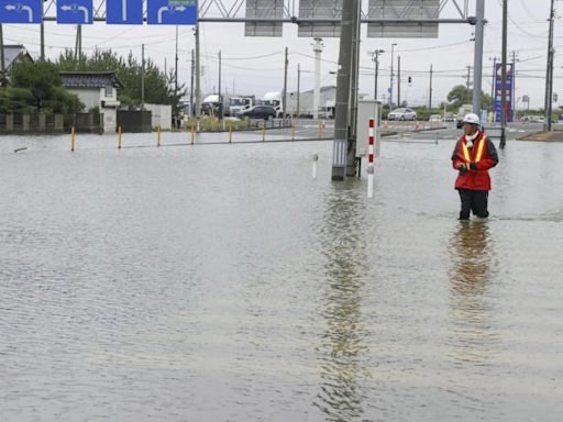 Three missing, 4,000 evacuated as heavy rains in Japan trigger floods, landslides - Times of India