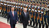 Putin gets red carpet welcome from Xi in China | CNN