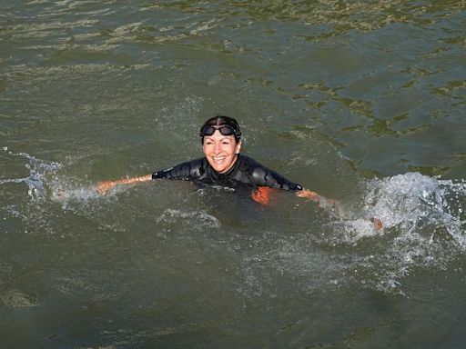 Paris mayor takes dip in the Seine to showcase its cleanliness as Olympic events loom