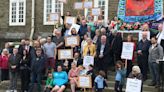 Furious parents protest against 'shameful' u-turn on new Llanelli school leaving children learning in 'falling down shed'
