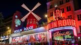 Legendary Paris cabaret venue Moulin Rouge gets its iconic windmill back in grand ceremony