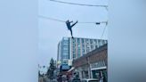 Washington state crime spree suspect gets stuck on telephone wire while running from police