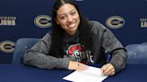 A Covington track and field athlete signs with Ohio State for gymnastics