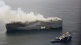 Burning car carrier off Dutch coast being towed away from shipping lanes