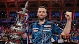 World Matchplay Darts: Luke Humphries joins the greats after beating Michael van Gerwen to claim title in Blackpool