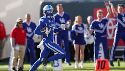 What made Chad Johnson challenge Kentucky football star Barion Brown to a race
