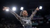 The Latest: Biles dominates despite injury. Nadal advances and Durant returns