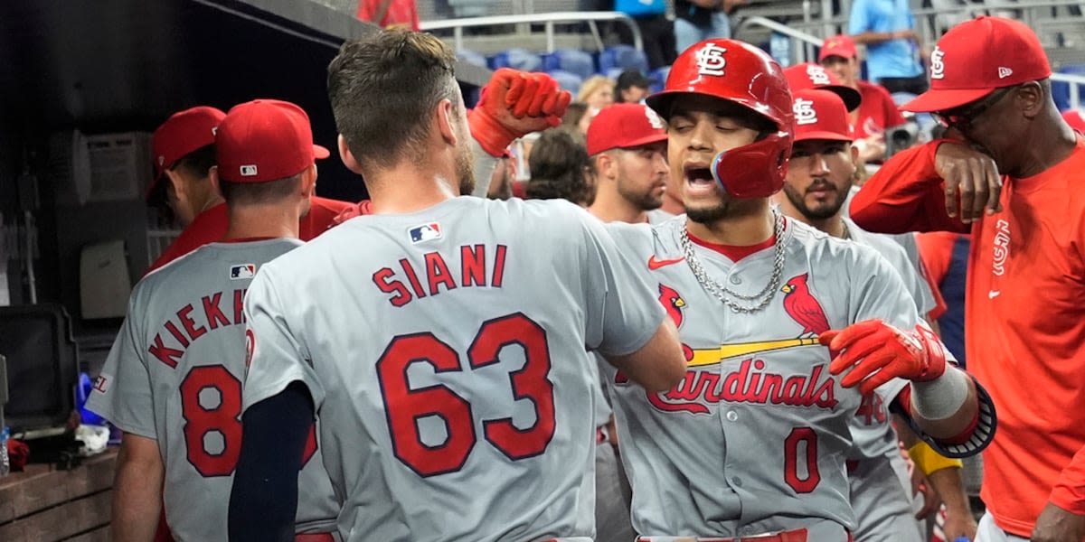 Winn's homer in 12th, Carlson's throw lead Cardinals over Marlins for 1st winning record since April