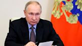 Cornered in Ukraine, Putin ditches annual news conference