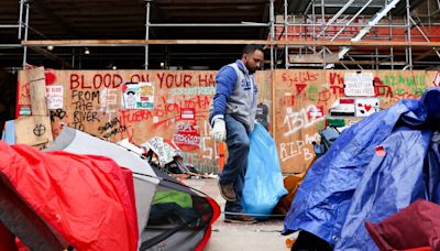 UCLA clears mounds of trash left from pro-Palestinian encampment, counter-protesters