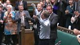 Craig Mackinlay: Standing ovation for MP who had hands and feet amputated as he returns to parliament