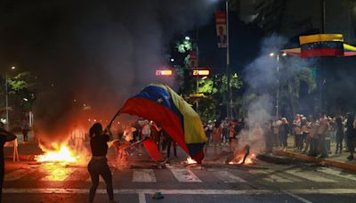 Protesters clash with police in Venezuela after Nicolas Maduro wins re-election