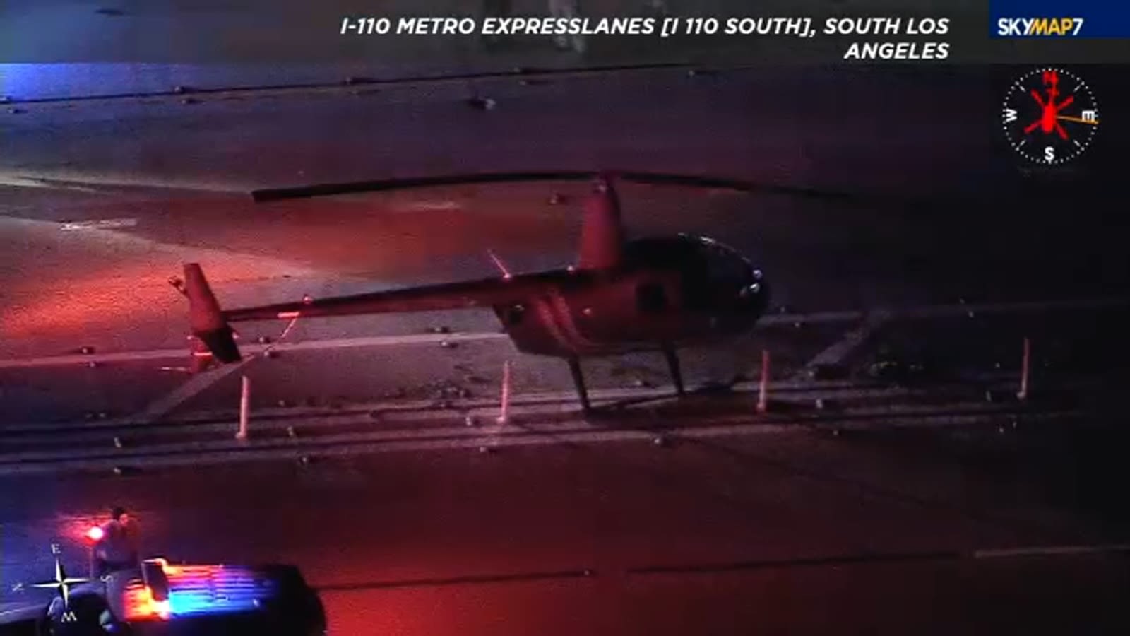 Helicopter lands on freeway in South L.A., blocks traffic for hours