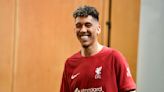 Robert Firmino sends football world into meltdown after posing in a Premier League kit - that isn't Liverpool's