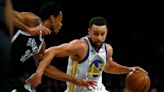 Stephen Curry scores 29 points, Warriors overcome slow start to beat the Nets 109-98