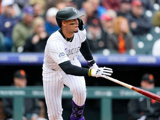 Rockies break loose for 7 runs in the 4th inning, beat Giants 9-1 to end 4-game skid