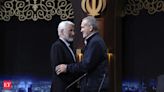 Iran holds runoff presidential vote pitting hard-line former negotiator against reformist lawmaker - The Economic Times